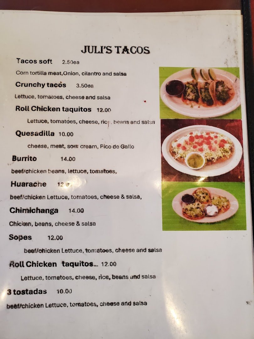 Tacos and sides on a simple table.
